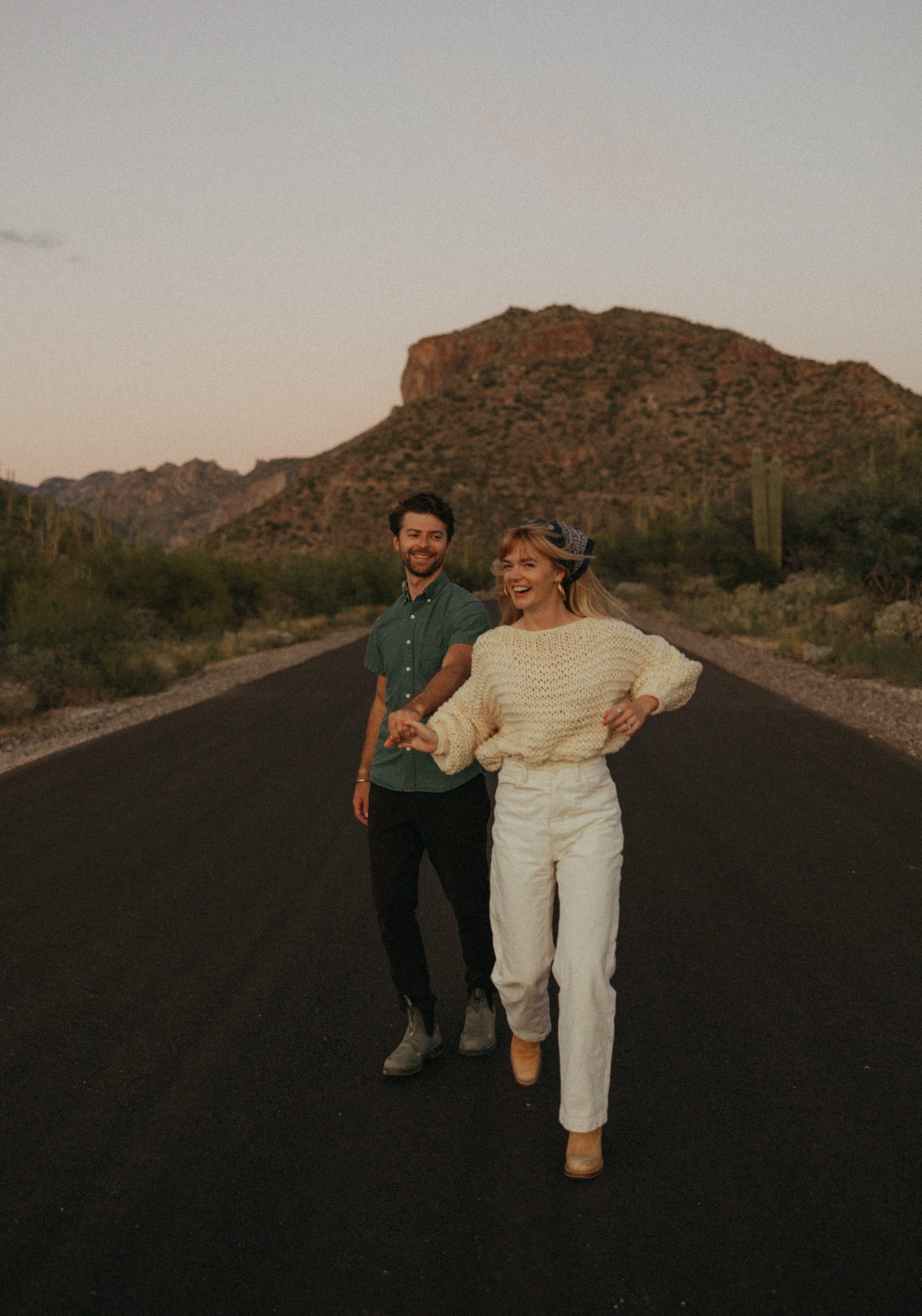 couple running in desert