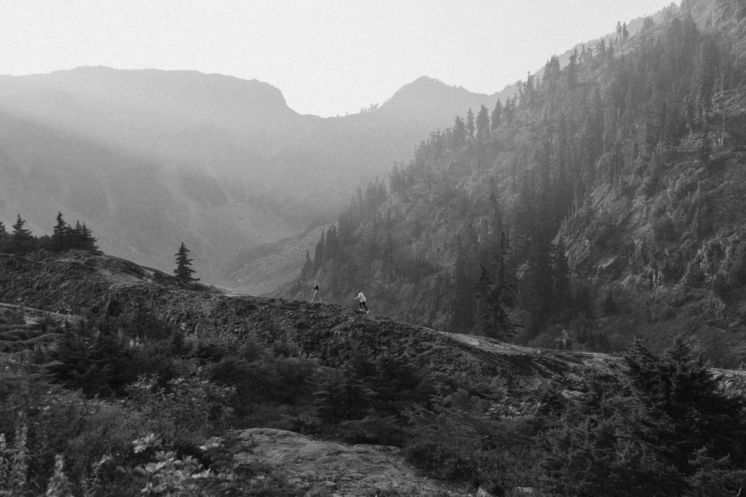 Couple in the north cascade mountains on a ridge